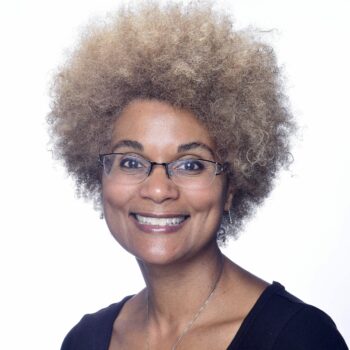 Smiling black woman wearing glasses